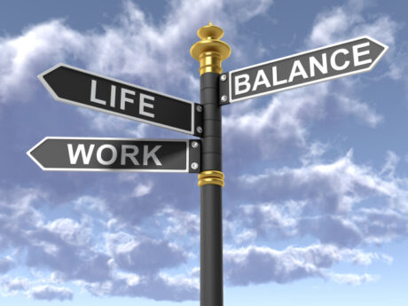 road signs showing work life balance in three directions