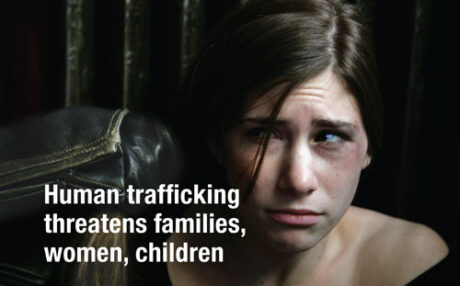 young sad woman looking up with text stating human trafficking threatens families, women, children