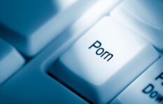 the word porn written on keyboard of computer